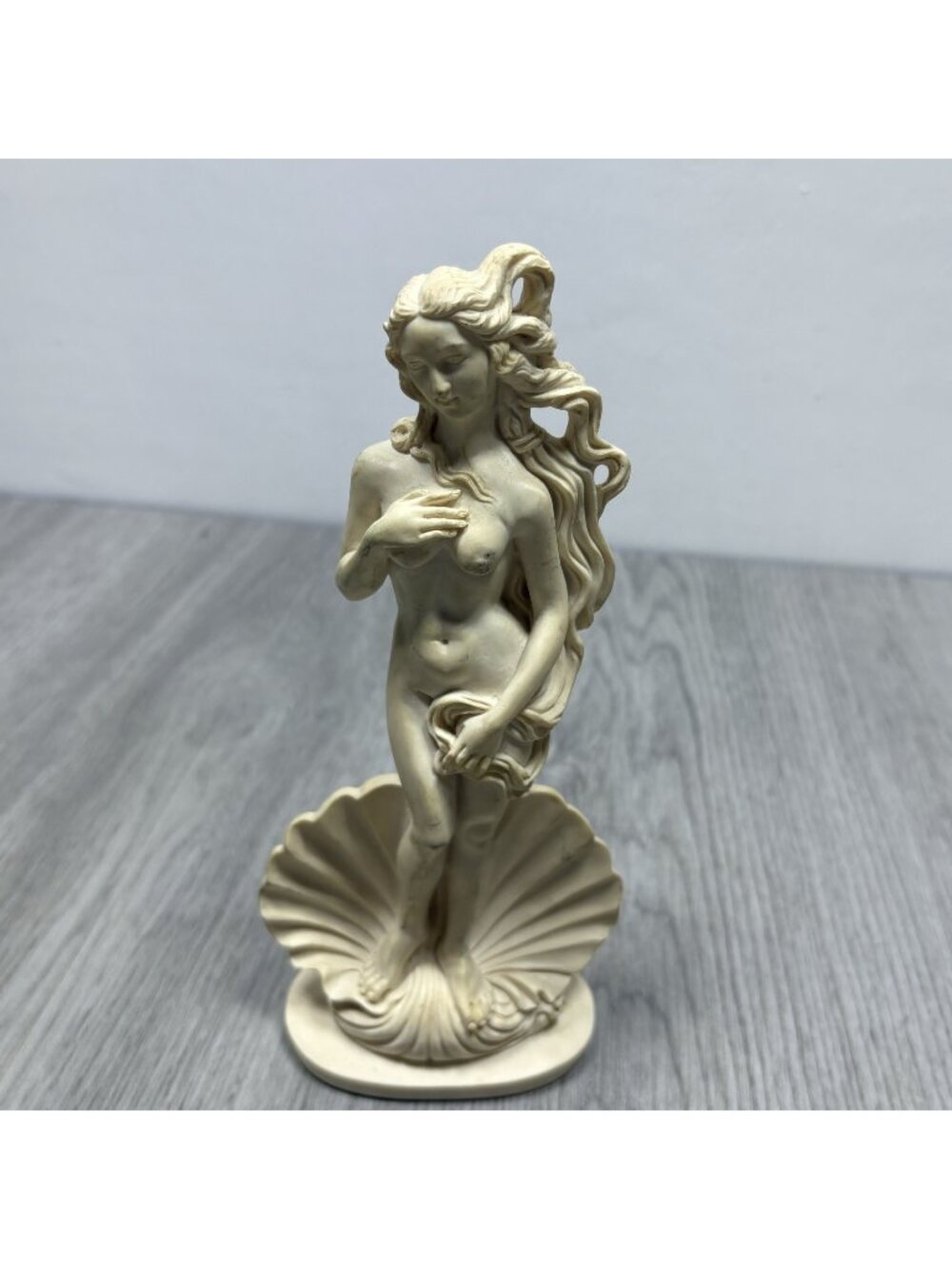 figurine of Aphrodite (or Venus) rising from a seashell JBL 1998 8.5"